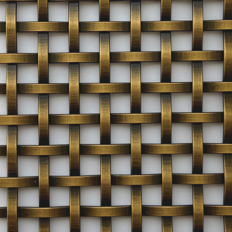 Close-up of a gold-toned woven lattice pattern formed by interlaced metal strips.